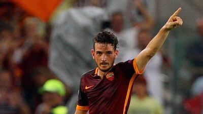 Alessandro Florenzi of AS Roma celebrates after scoring a long-range goal, his team's only score, in a 1-1 draw with Barcelona on Wednesday night at the Stadio Olimpico. Paolo Bruno / Getty Images