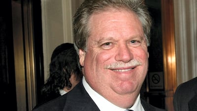 Elliott Broidy poses for a photo at an event in New York, Feb. 27, 2008. AP
