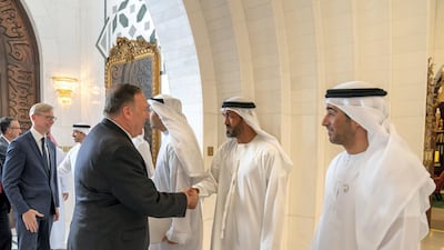 Mohamed Mubarak Al Mazrouei, undersecretary of the Crown Prince Court of Abu Dhabi, greets Mike Pompeo, US Secretary of State, ahead of the meeting at Sea Palace. Seen with Ali Saeed Al Neyadi. Mohamed Al Hammadi / Ministry of Presidential Affairs