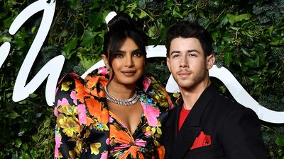 Chopra and Jonas pose on the red carpet at The Fashion Awards 2021 in London on November 29, 2021. AFP