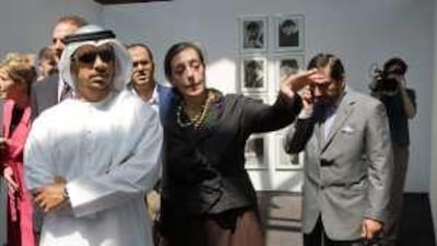 Sheikh Sultan bin Tahnoon, chairman of the Abu Dhabi Tourism Authority, visits the Adach platform accompanied by its curator, Catherine David, during the vernissage of the 53rd Biennale International Art Exhibition in Venice yesterday.