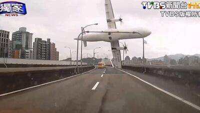TransAsia Airways Flight GE235 clipped a bridge and plunged into a river shortly after take-off. Only 15 people survived. EPA
