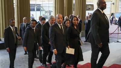 World leaders and heads of state arrive for the reception at Buckingham Palace in London. PA
