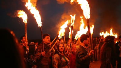 Syrian Kurds mark Nowruz in Qamishli on Wednesday. Damascus recently declared the festival a paid national holiday. AFP