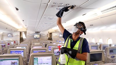A handout image provided by Emirates airlines on March 8 in Dubai shows air vents aboard an Emirates Airbus A380-800 aircraft being disinfected