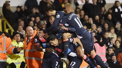 Newcastle United’s Ayoze Perez celebrates with teammates after scoring their second goal and the match-winner. Toby Melville / Reuters