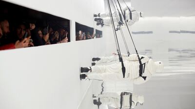 Models present creations from the Moncler Autumn/Winter 2020 collection during Milan Fashion Week in Milan, Italy. Reuters