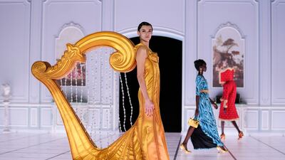 A creation from the Moschino Fall/Winter 2022-2023 fashion collection, unveiled during Fashion Week in Milan, Italy, February 24, 2022. AP Photo