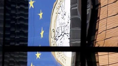 Unlike the 1930s, euro-zone countries today are prepared to go to great lengths to save the single currency. Virginia Mayo / AP Photo