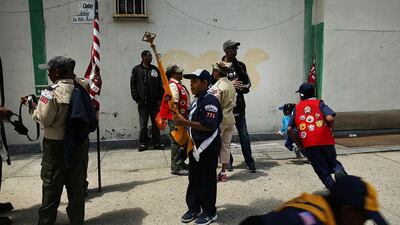 Boy Scouts prepare to march with soldiers, veterans and various other military aligned groups in the 369th Infantry Regiment Parade in Harlem on May 18, 2014 in New York City. Spencer Platt / Getty
