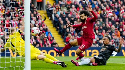Liverpool's Mohamed Salah scores his side's opening goal. AP