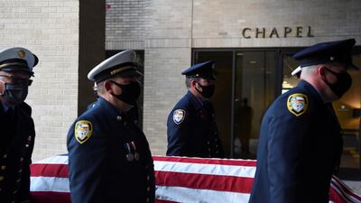 Members of the Houston Fire Department carry the casket of Jerry Pacheco, a firefighter who died of coronavirus, at a memorial service in Houston, Texas, US. Reuters