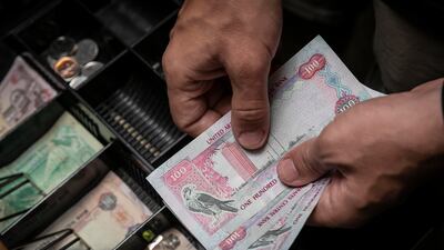 T-bonds are fixed-rate government debt securities that pay semi-annual interest payments until maturity. Antonie Robertson / The National