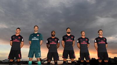 Olivier Giroud, third from right, was among the Arsenal players displaying the new third kit in Sydney, Australia as part of Arsenal's pre-season tour. Paul Miler / EPA