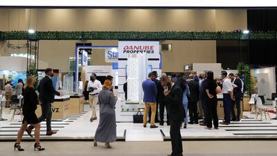 Visitors at the Danube Properties stand on the first day of Cityscape Global in Dubai.