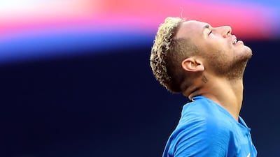 Neymar of Brazil switches up his hairstyle often, but almost always looks good. EPA