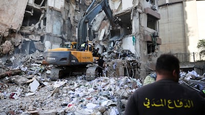An earthmover is used in a recovery operation at the site of an Israeli attack carried out in Beirut. Reuters