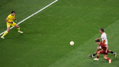 Roma's Paulo Dybala scores their opening goal. AP