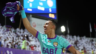 Al Ain's Soufiane Rahimi celebrates winning the league title