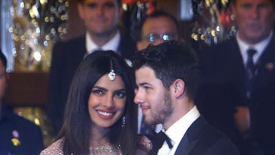 Bollywood actress Priyanka Chopra and her musician husband Nick Jonas arrive. AP Photo
