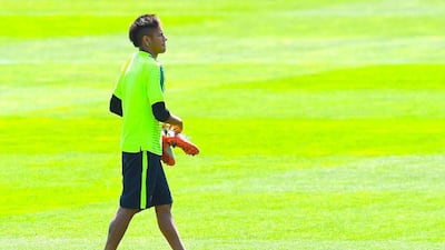 Neymar of Barcelona leaves the pitch after Tuesday's team training session ahead of Saturday's Champions League final in Berlin. David Ramos / Getty Images
