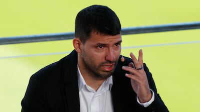 Tearful Barcelona striker Sergio Aguero after announcing his retirement from football during a press conference at Camp Nou on Wednesday, December 15, 2021. Reuters