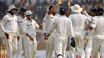 Indian players celebrate the culmination of a job well done.
