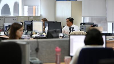 Working hours during Ramadan will be reduced by two hours. Pawan Singh / The National