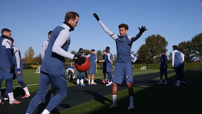 Harry Kane and Dele Alli shoot some hoops.