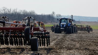 Farmers sow barley in Starobesheve, in Russian-controlled eastern Ukraine. EU officials believe Russia's exports include pilfered Ukrainian grain. Reuters