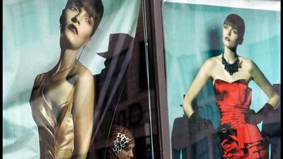 A Palestinian woman watches as supporters of the Popular Front for the Liberation of Palestine (PFLP) rally to mark the 45th anniversary of their organisation in the West Bank city of Nablus. Nasser Ishtayeh / AP Photo