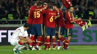 Spain's players celebrate their goal against Georgia during the World Cup 2014 qualifying match.