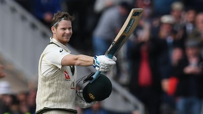 Australia's Steve Smith celebrates after reaching 200 on Day 2 of the fourth Ashes Test against England. AFP
