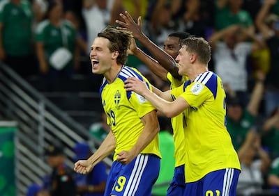 Mattias Svanberg, left, celebrates scoring Sweden's fourth goal only 12 seconds after coming on as a substitute. Reuters
