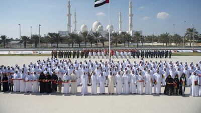 Sheikh Mohammed bin Rashid, Vice President and Ruler of Dubai, along with Sheikh Mohammed bin Zayed, Crown Prince of Abu Dhabi and Deputy Supreme Commander of the Armed Forces, Sheikh Saud bin Saqr Al Qasimi, Ruler of Ras Al Khaimah, Sheikh Hamad bin Mohammed Al Sharqi, Ruler of Fujairah, Sheikh Saud bin Rashid Al Mualla, Ruler of Umm Al Quwain, Dr Sheikh Sultan bin Mohammed Al Qasimi, Ruler of Sharjah, and the families of the fallen, during the inaugural Commemoration Day ceremony in Abu Dhabi. Rashed Al Mansoori / Crown Prince Court – Abu Dhabi