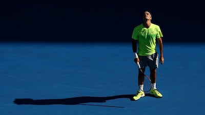 Roger Federer reacts during his third round loss to Andreas Seppi on Friday at the Australian Open. Cameron Spencer / Getty Images / January 23, 2015