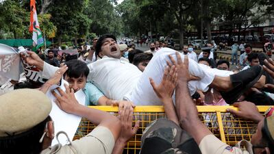 Indian Police try to control Youth Congress activists as they protest in New Delhi. EPA