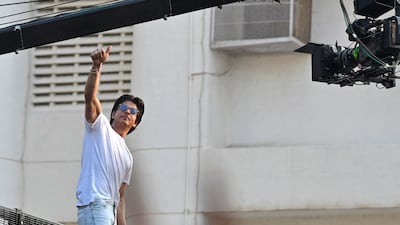 Bollywood actor Shah Rukh Khan greets fans during his birthday celebrations at his residence Mannat in Mumbai on November 2, 2022. AFP