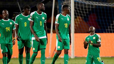 Senegal forward Sadio Mane, right, celebrates after scoring the first of his two second-half goals against Kenya. AFP