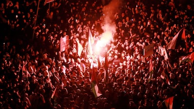 Jordanians chant slogans during a demonstration near the Embassy of Israel in Amman on March 28, 2024, in support of Palestinians amid ongoing battles between Israel and the militant Hamas group in the Gaza Strip. (Photo by Khalil MAZRAAWI / AFP)