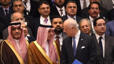 Saudi minister of Arab Gulf affairs Thamer Al Sabhan (left), stands with Saudi foreign minister Adel Al Jubeir (centre-right) and UN special envoy for Syria crisis Staffan de Mistura (third on right) for a group picture during the Syrian opposition meeting in Riyadh on November 22, 2017. Fayez Al Nureldine / AFP