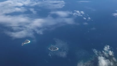 Flying over the turquoise waters of the Seychelles. Courtesy Hayley Skirka