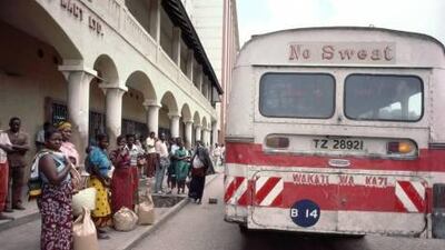 Touring Tanzania by bus can be a long, adventurous and bumpy ride. Christopher Pillitz / Getty Images