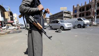Houthi fighters man a checkpoint in Sanaa on December 2, 2017. Yahya Arhab / EPA