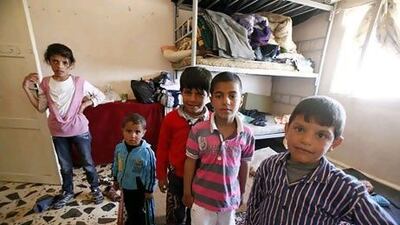 The children of Syrian refugees, who fled the violence in Syria, receive humanitarian aid and shelter in the border city of Ramtha in northern Jordan.