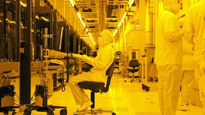 Engineers work in one of several clean rooms at GlobalFoundries' Fab 1 in Dresden, Germany. Jeff Topping / The National