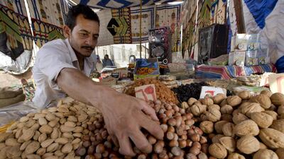 Egypt has pledged to implement the new tax in exchange for unlocking finance from the World Bank. Amr Nabil / AP Photo
