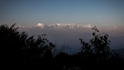 Emergency workers have been battling bad weather to locate eight climbers missing on India's second highest mountain, an official said. AFP