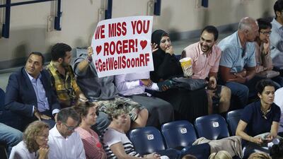 Spectator hols banner to support Roger Federer of Switzerland during the match between Novak Djokovic of Serbia against Tommy Robredo of Spain at Dubai Duty Free Tennis ATP Championships in Dubai, United Arab Emirates, 22 February 2016. EPA/ALI HAIDER