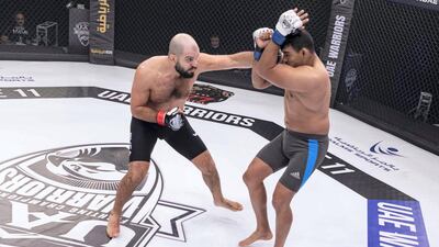 Tarek Suleiman (L) lands an early blow to Juscelino Ferreira. Courtesy UAE Warriors